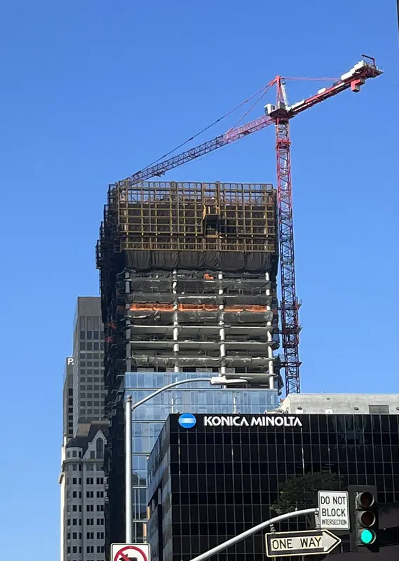A tower crane over a high-rise under construction at 8th and Figueroa, downtown Los Angeles