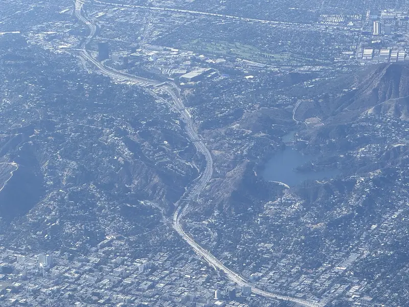 Aerial view of the Hollywood Freeway winding through Los Angeles neighbourhoods