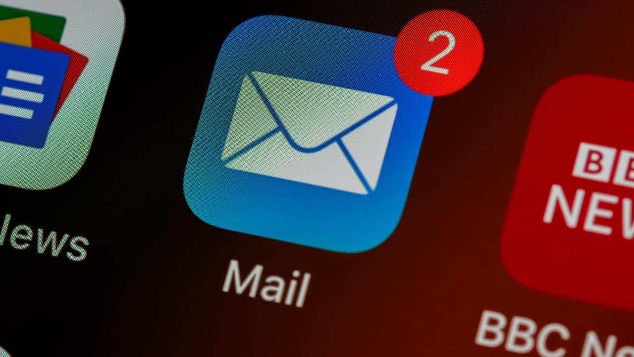 A mail app icon with unread messages on a phone screen