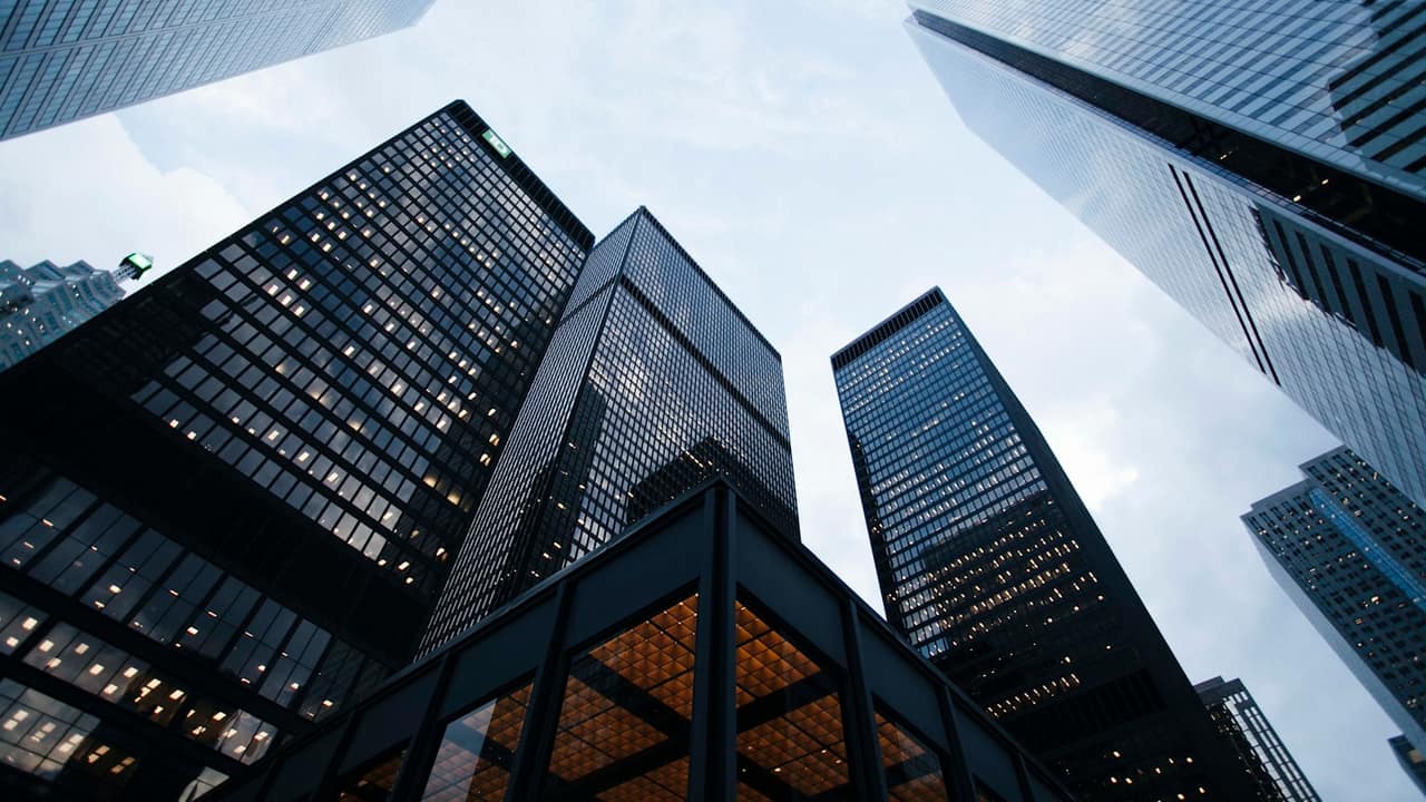 Glass towers seen from street level