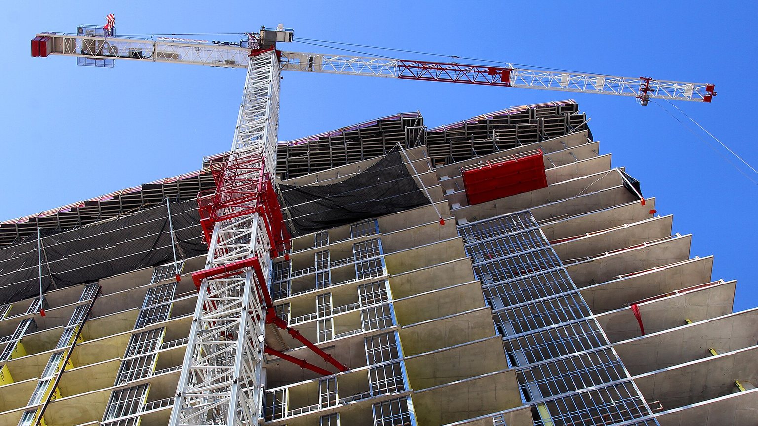 A tower crane on a high-rise under construction in Austin