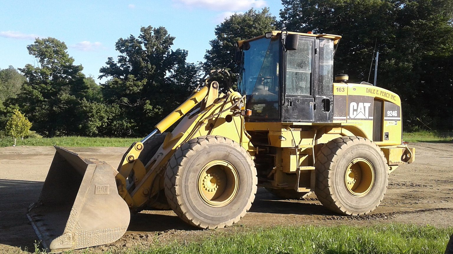 Excavator digging a foundation on a new construction site