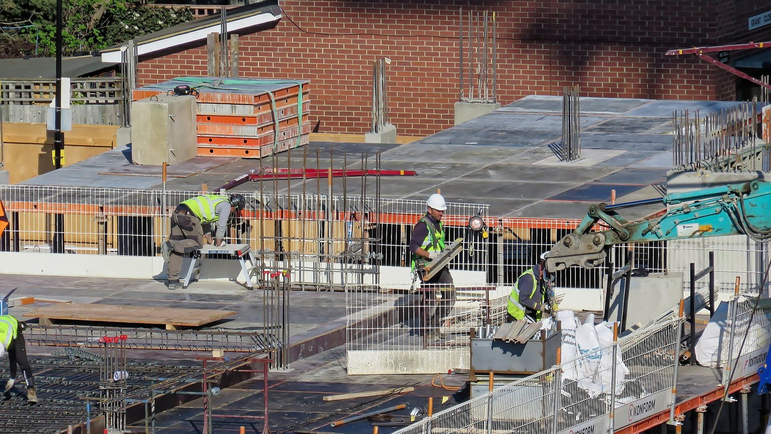Masonry and blockwork rising on an active construction site