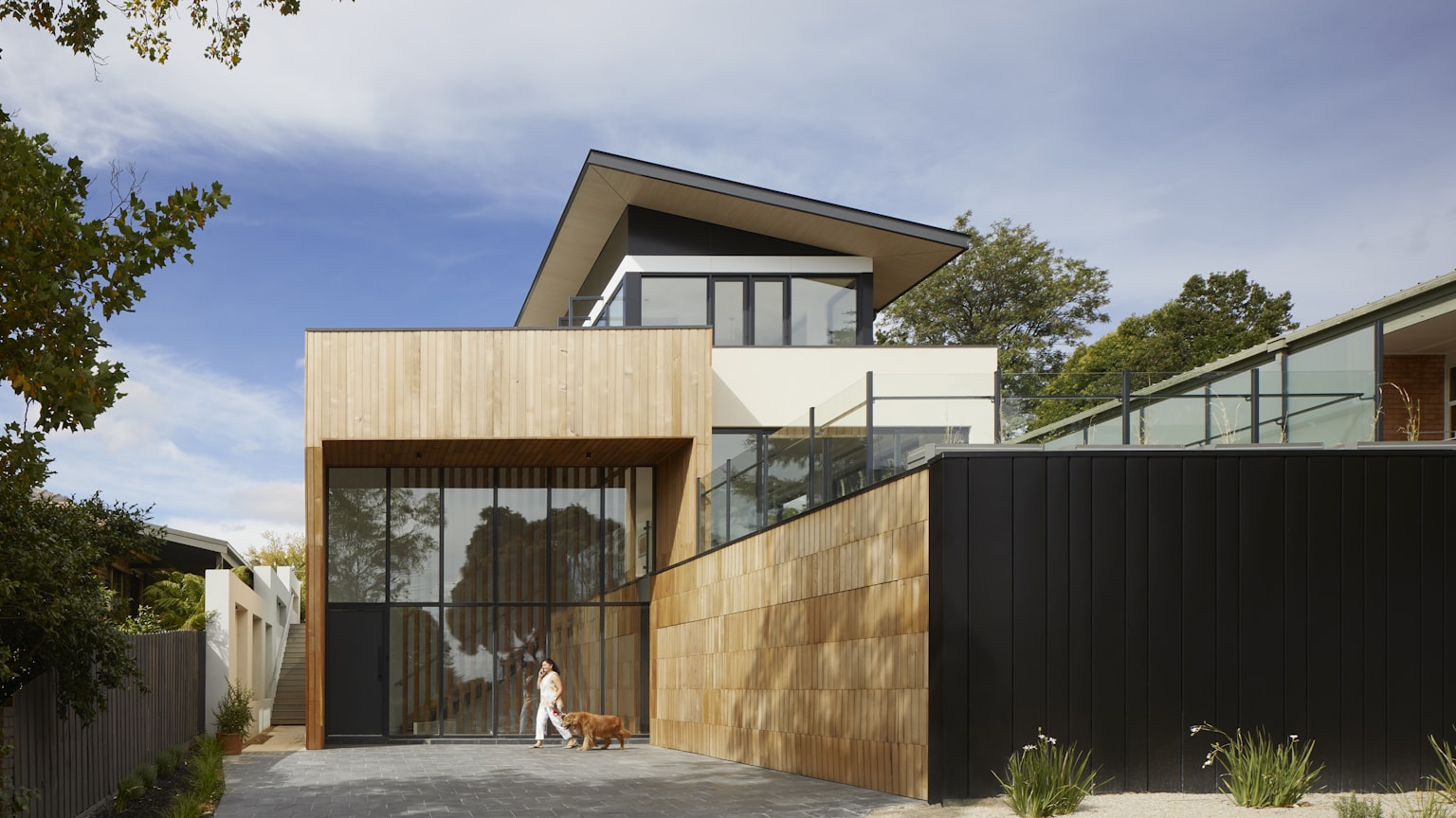 Large windows and glazed doors on a newly built house